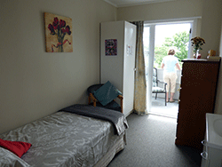Rest home in Auckland - Room with lady at balcony